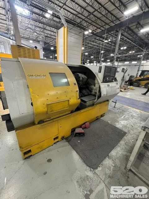 OKUMA CROWN 769 – 2000